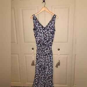 Women’s size 12 mini with long open front skirt, fits smaller 8-10